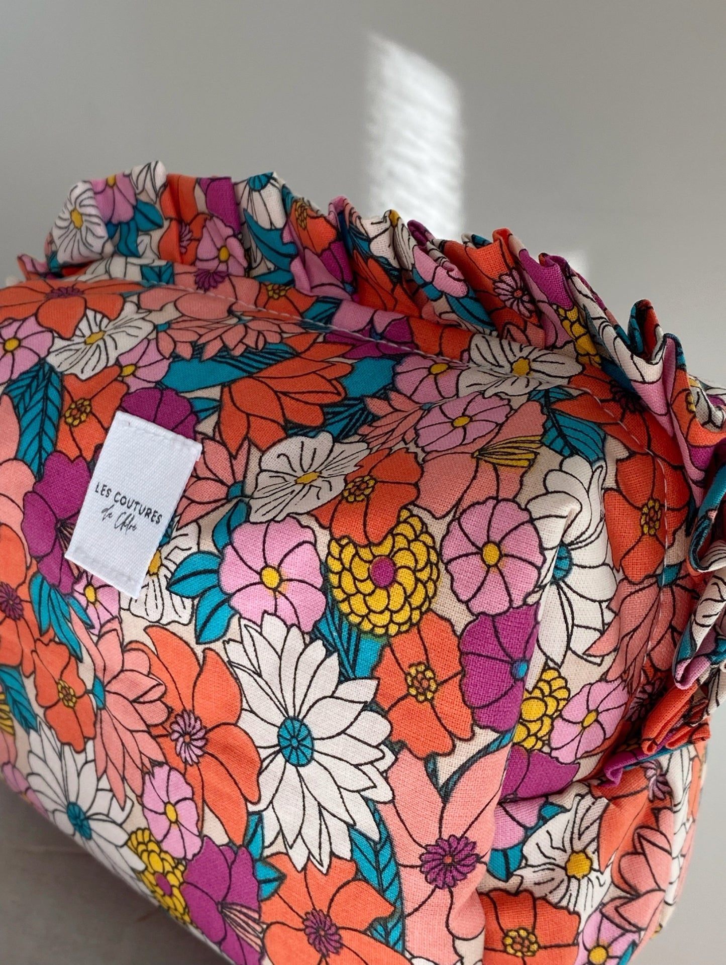 Trousse de toilette à volants
