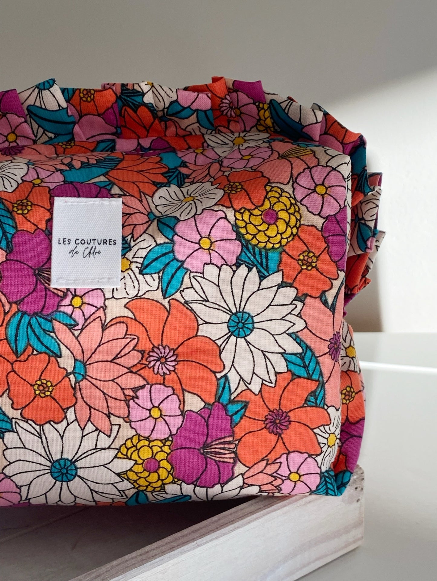 Trousse de toilette à volants