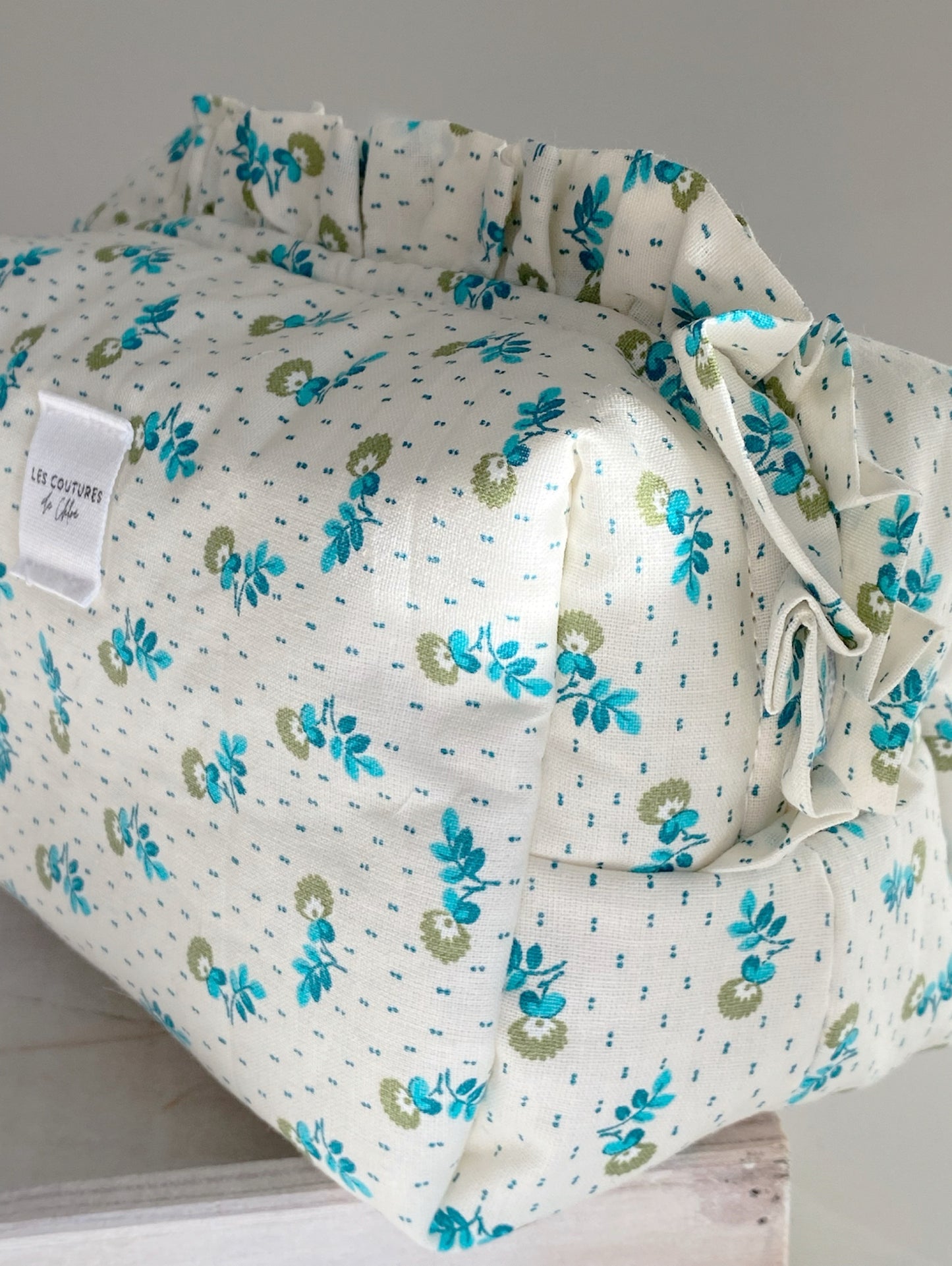 Trousse de toilette à volants