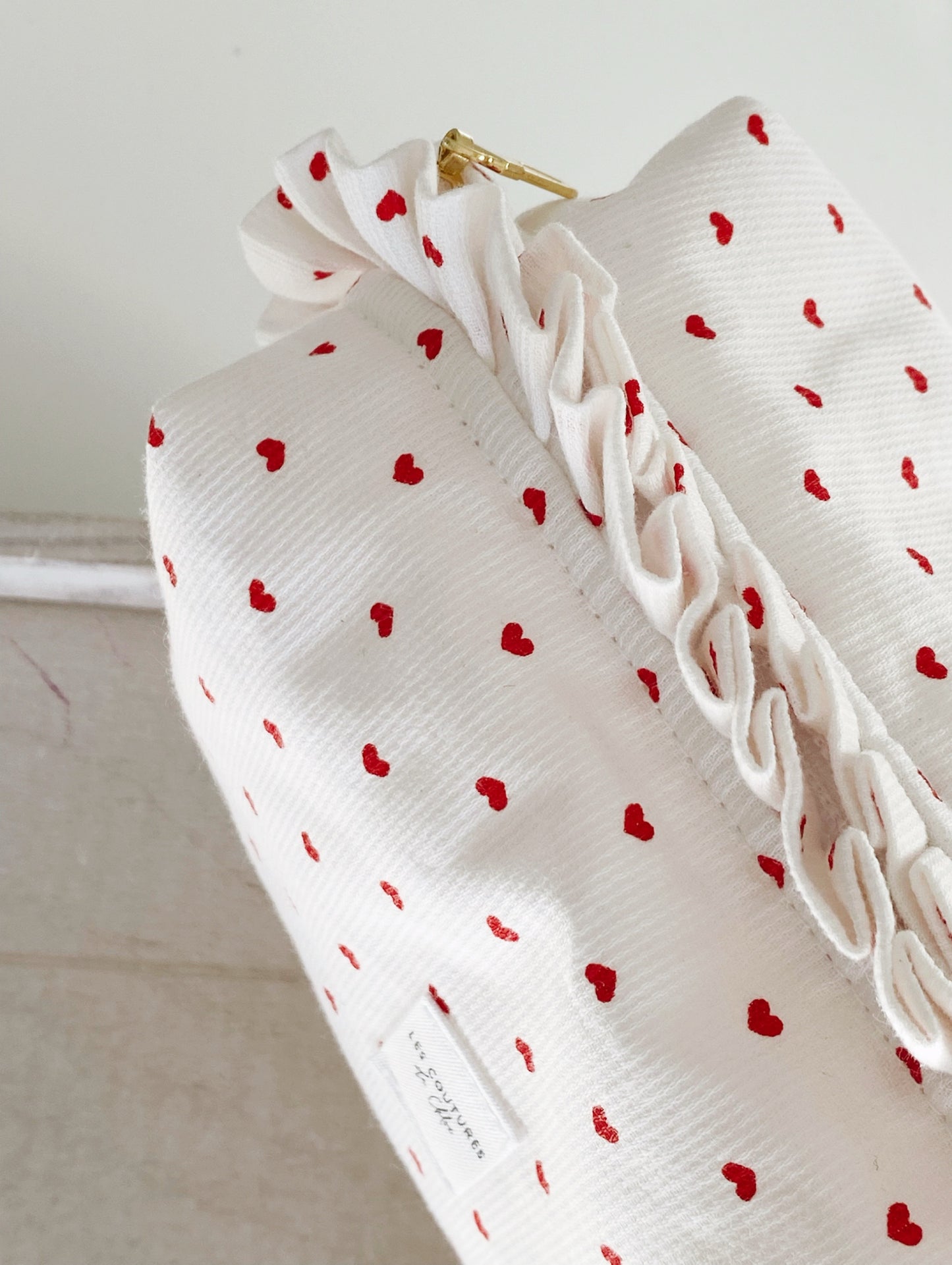 Trousse de toilette à volants