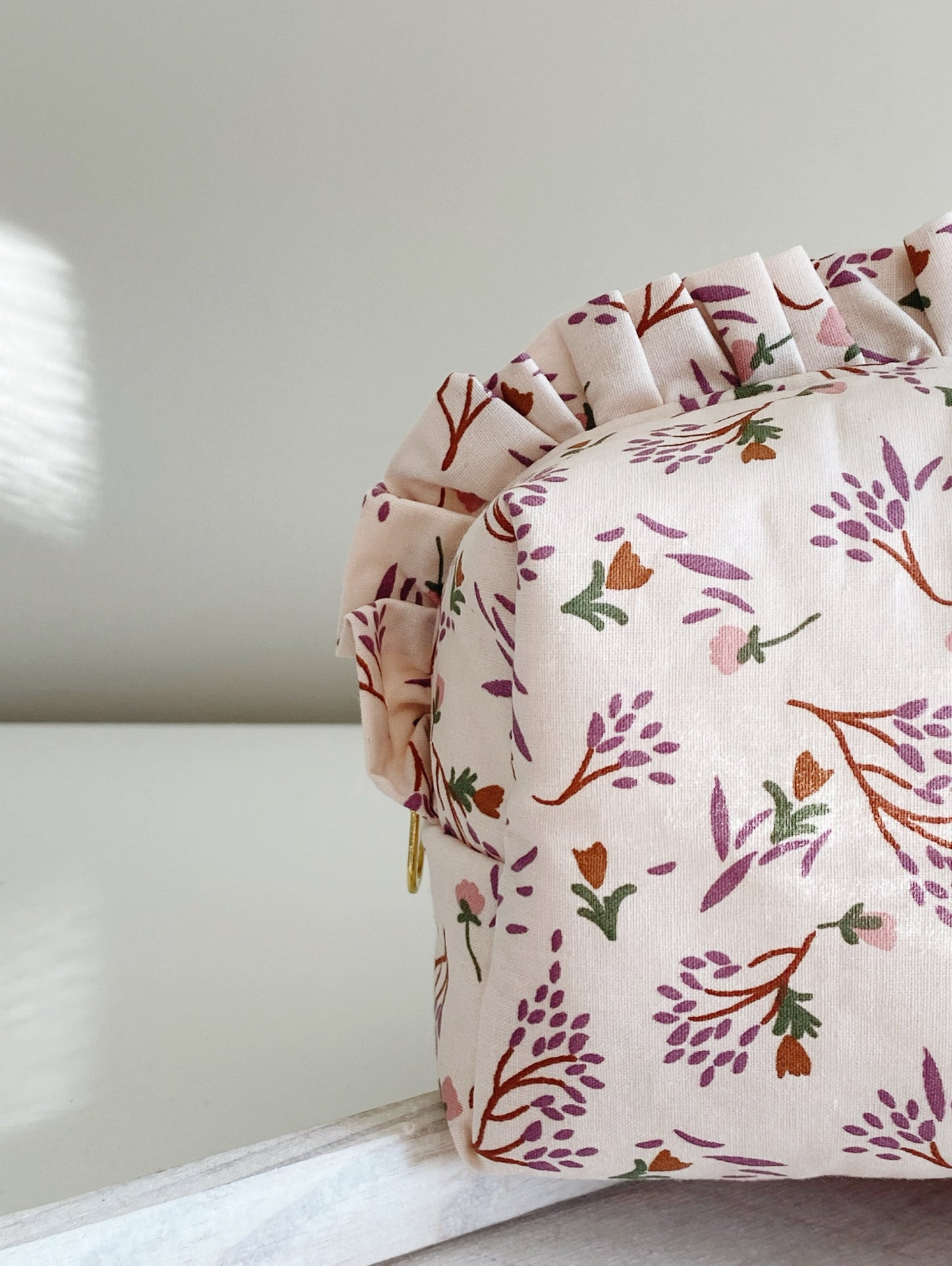 Trousse de toilette à volants