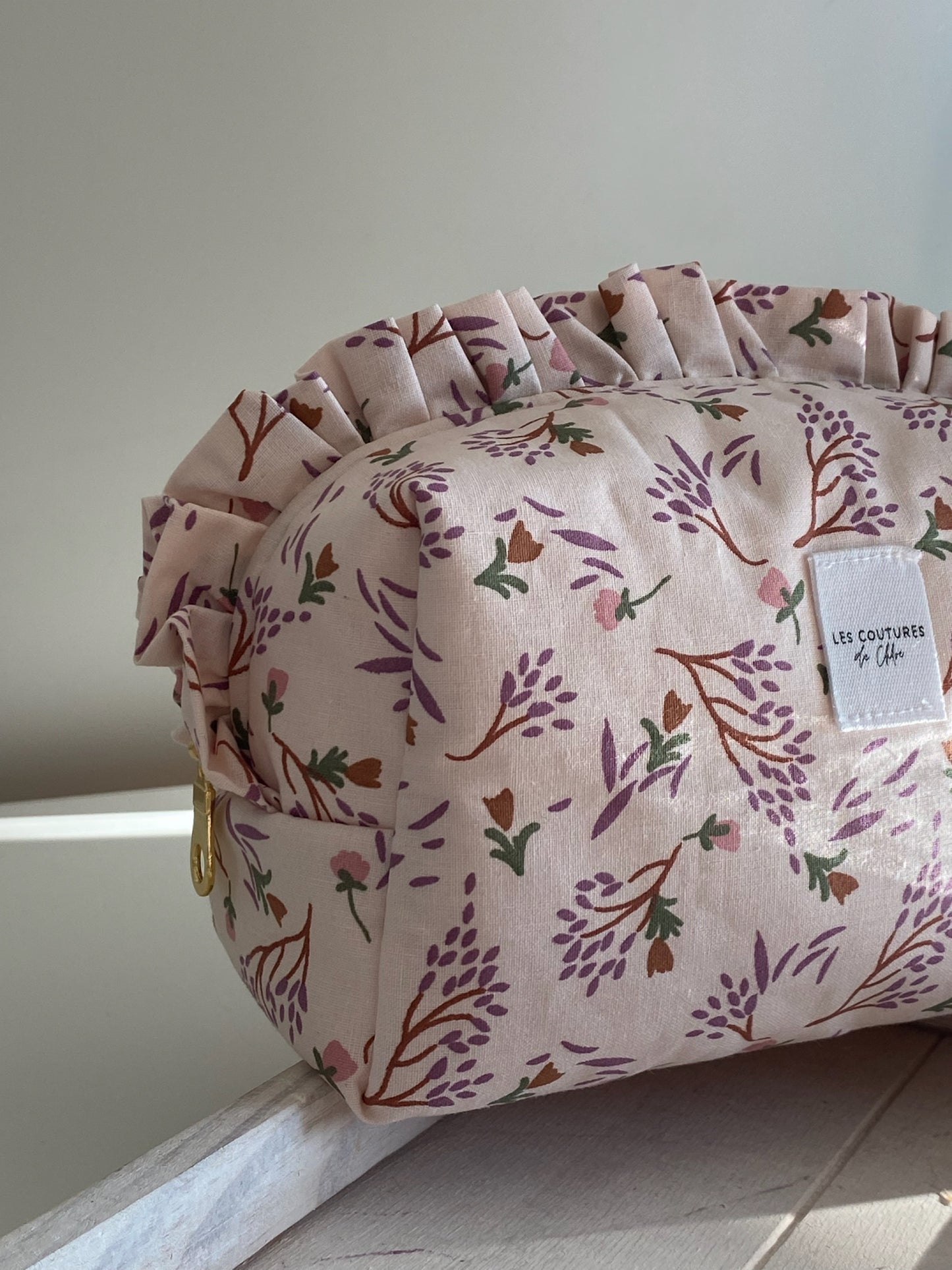 Trousse de toilette à volants