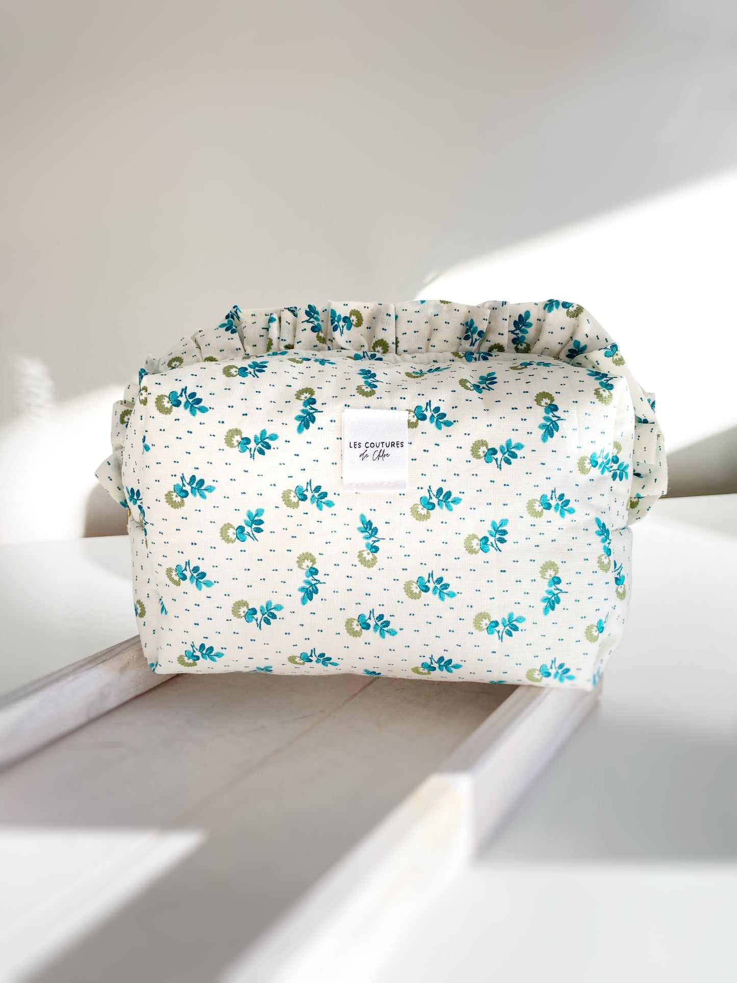 Trousse de toilette à volants