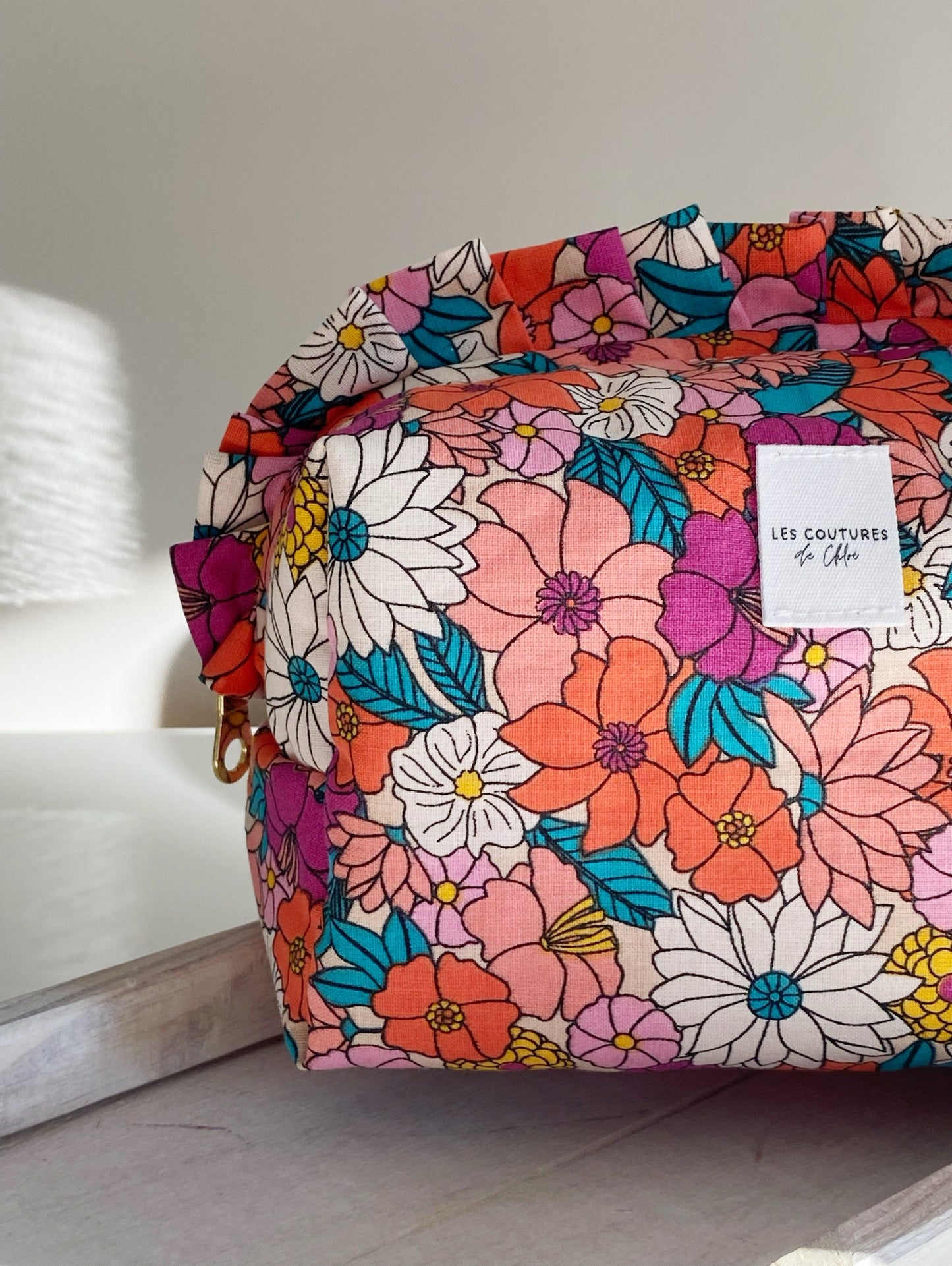 Trousse de toilette à volants