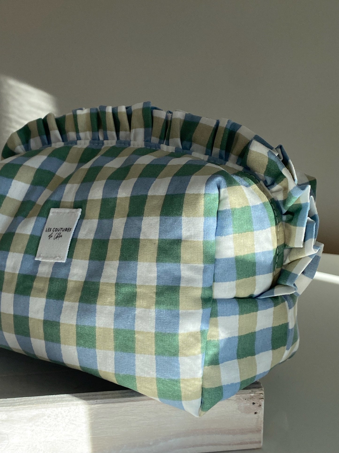 Trousse de toilette à volants