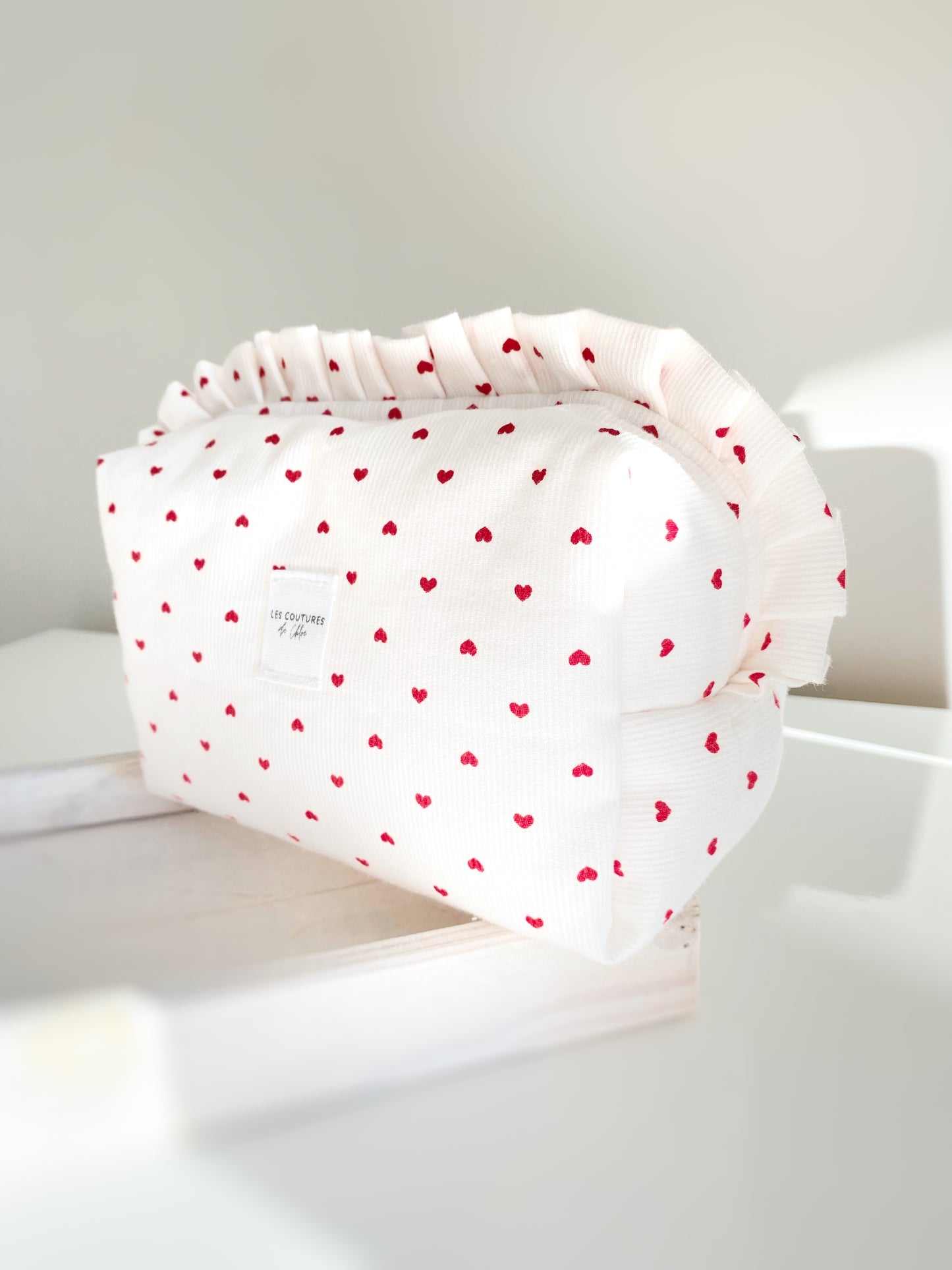 Trousse de toilette à volants