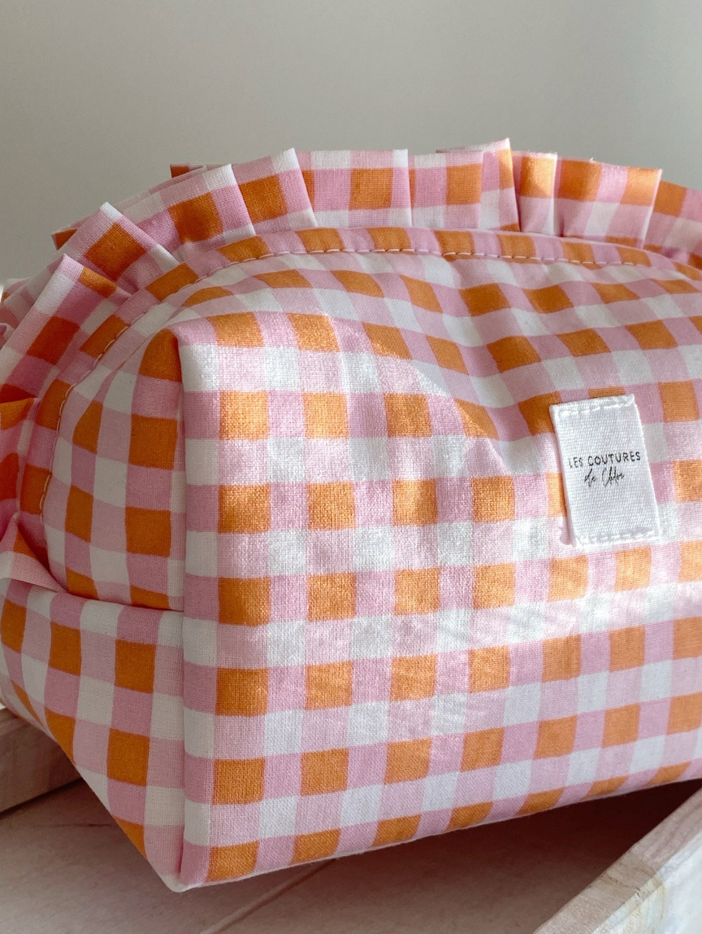 Trousse de toilette à volants