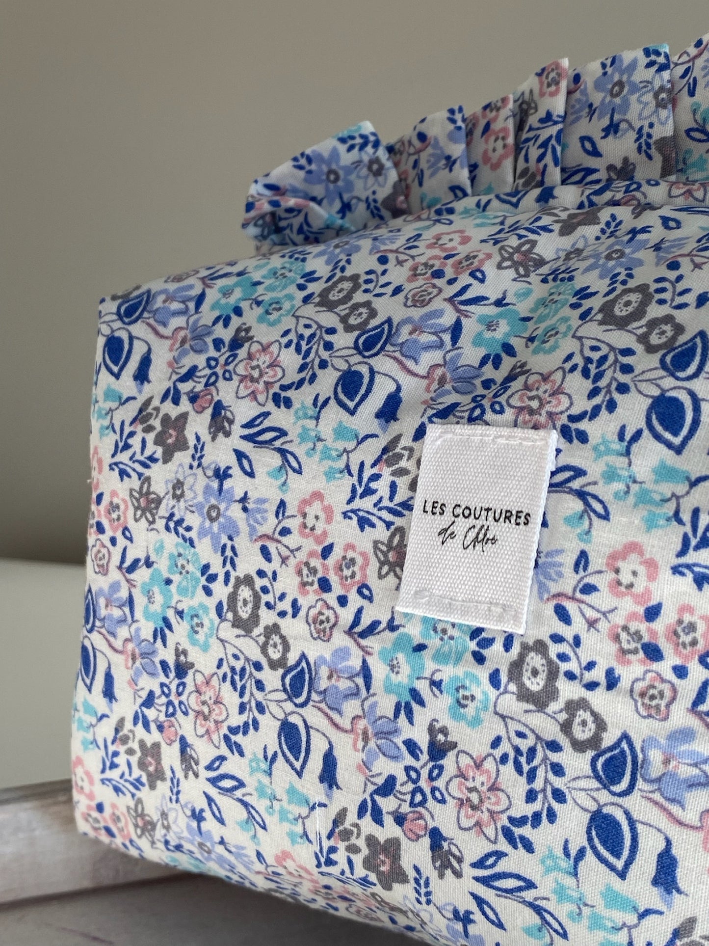 Trousse de toilette à volants
