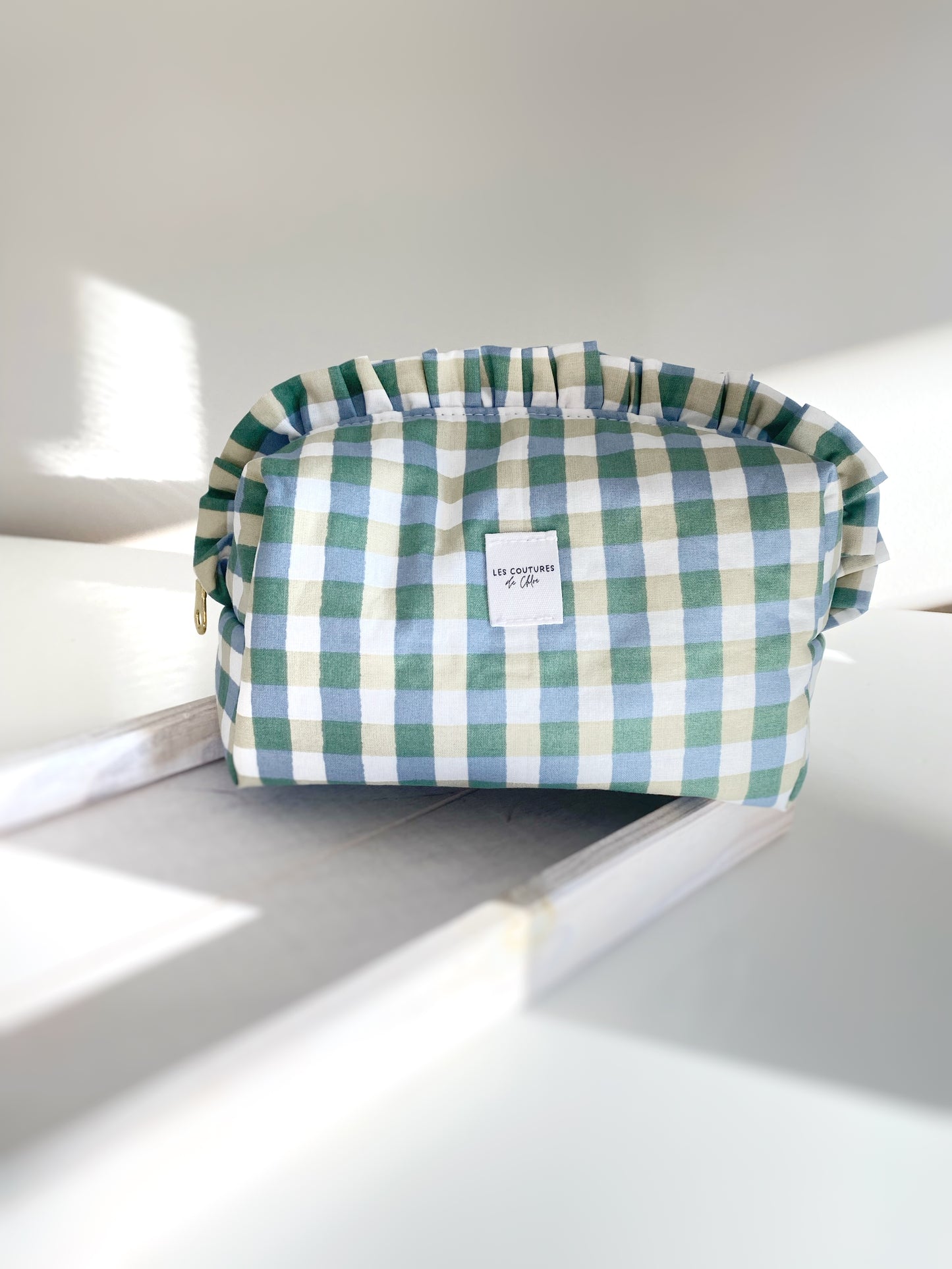 Trousse de toilette à volants