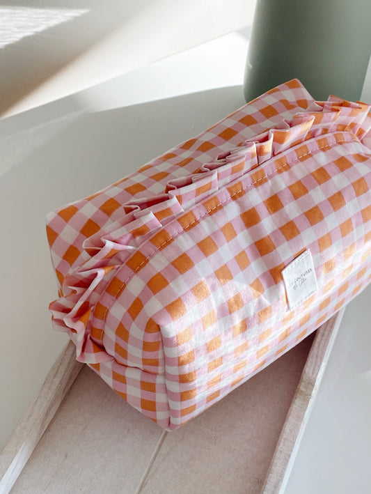 Trousse de toilette à volants