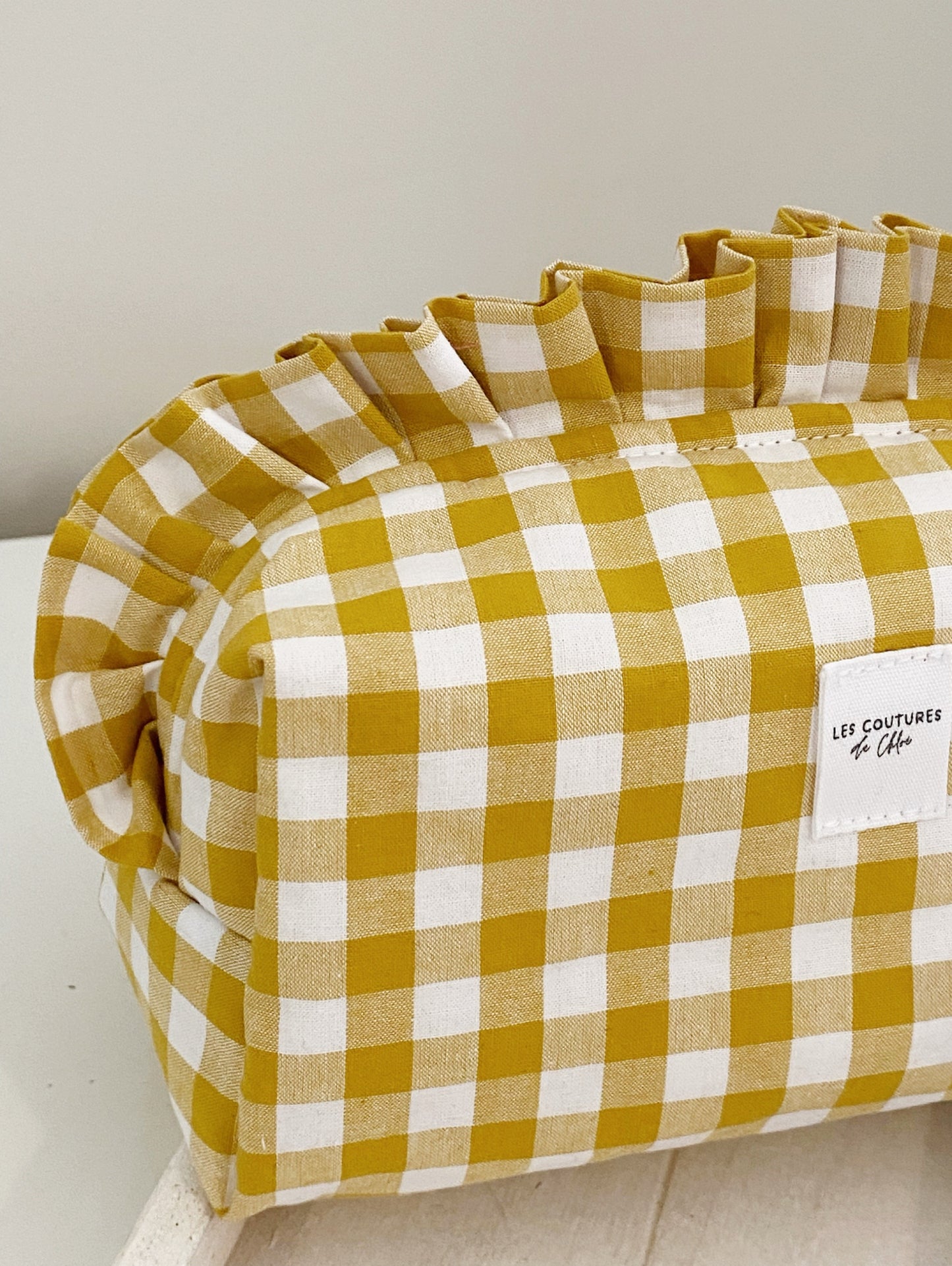 Trousse de toilette à volants