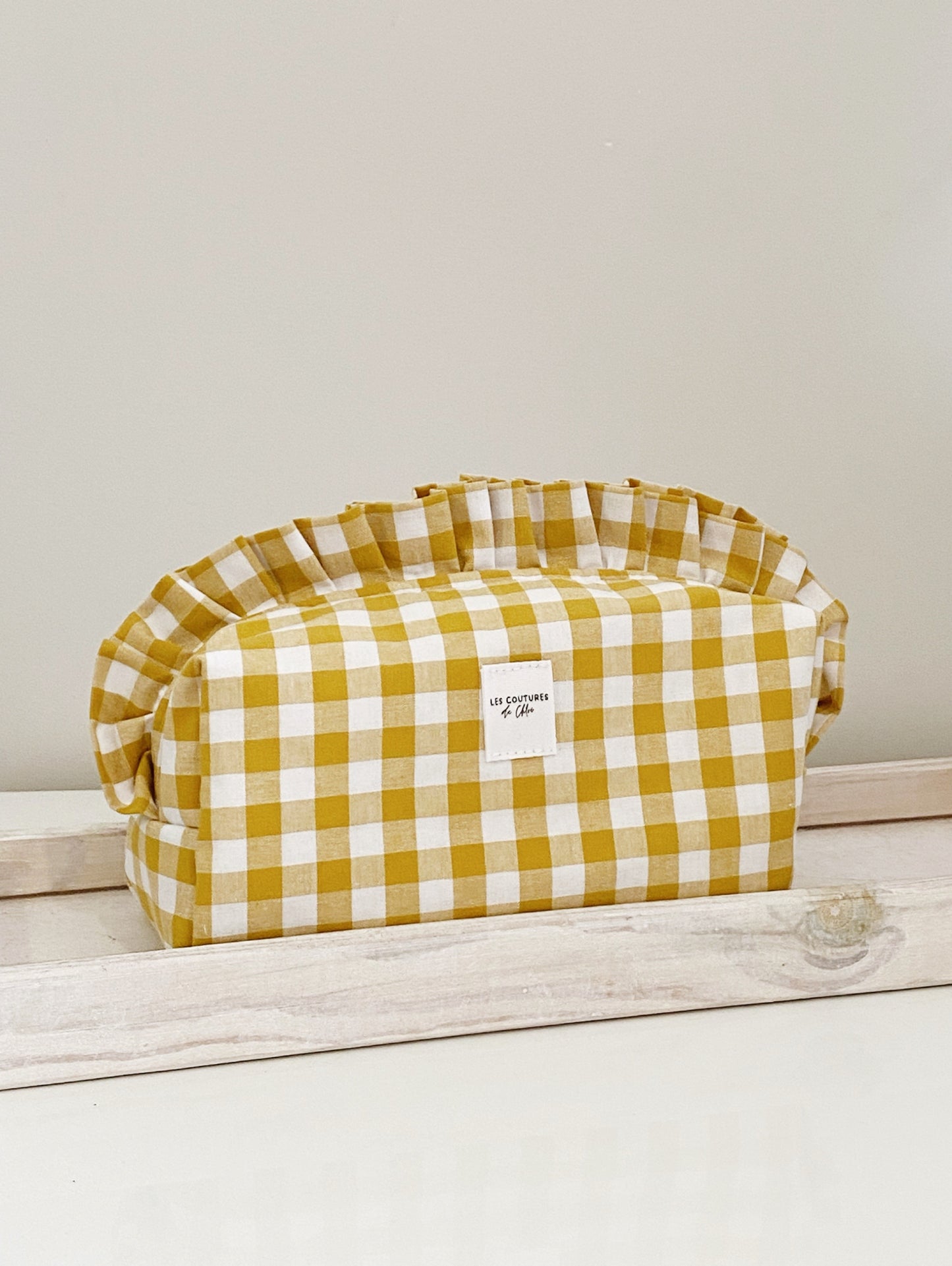 Trousse de toilette à volants